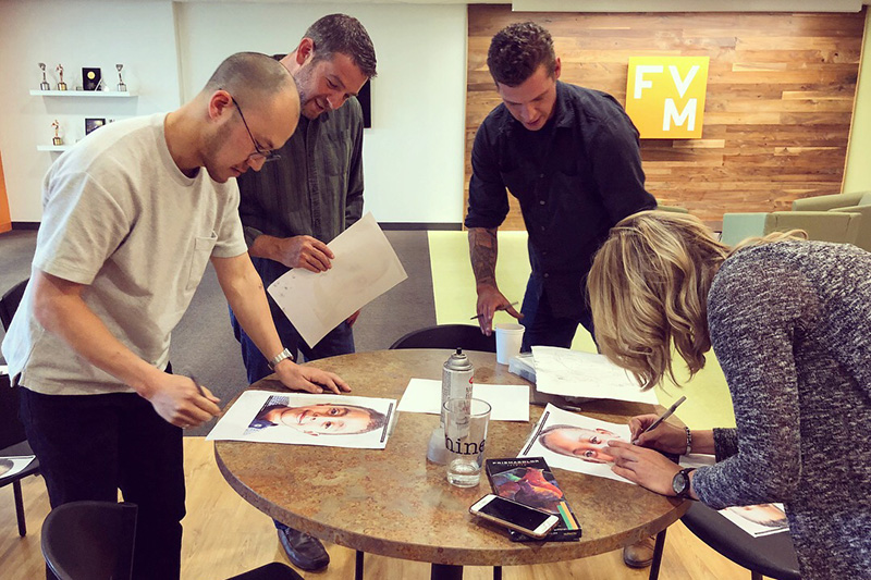 FVM employees tracing children's photos for the Memory Project